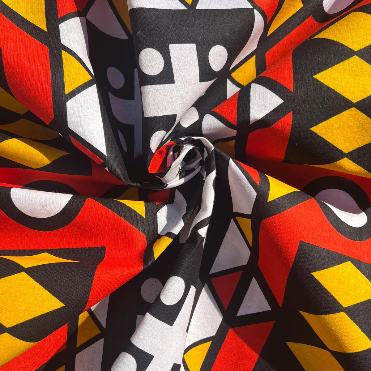Bold Ankara African print fabric by the yard for upholstery, throw pillows, curtains and statement home decor