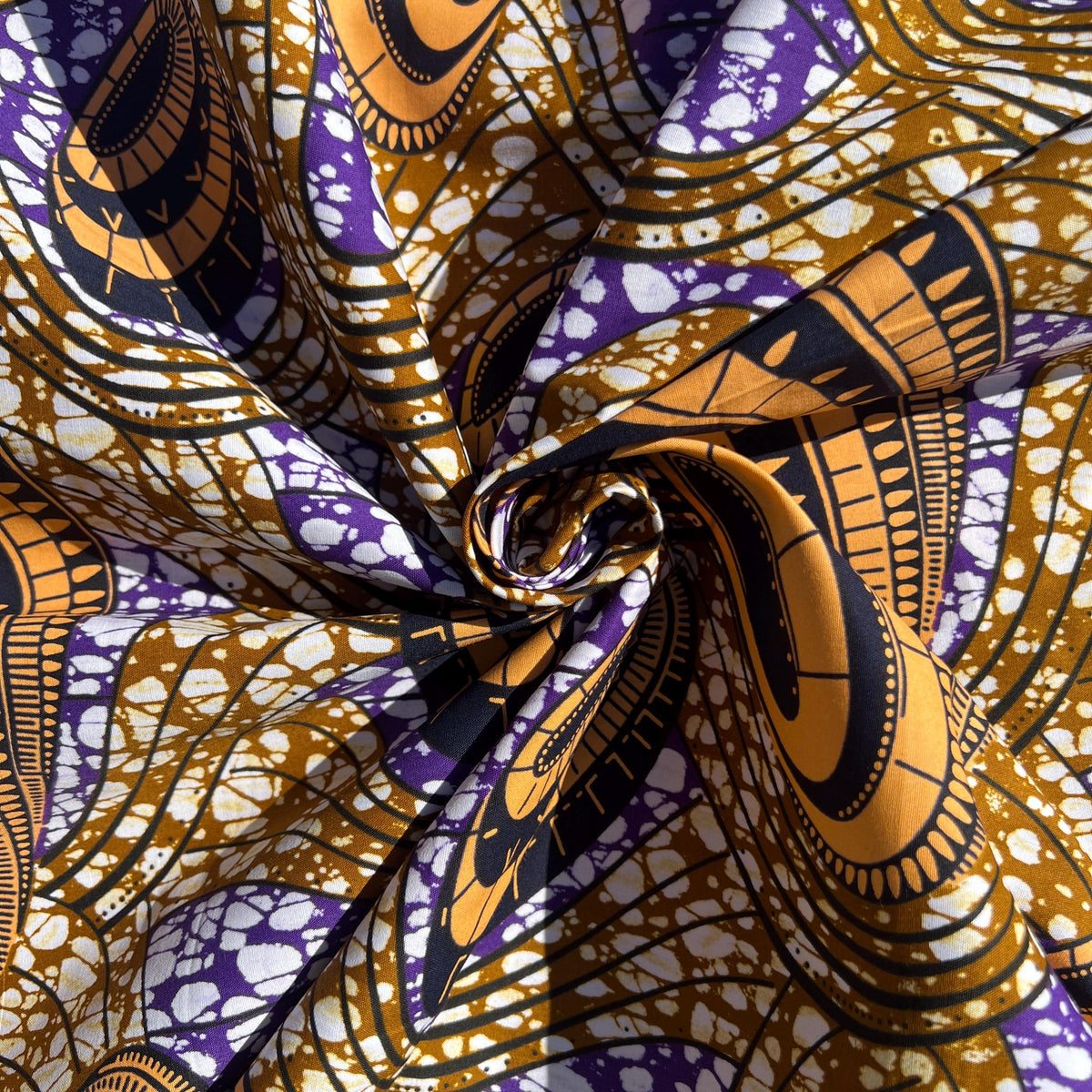 Premium original Ankara cotton fabric by the yard featuring vibrant African wax print pattern in bold colors, perfect for quilting, sewing dresses, and Afrocentric home decor projects.