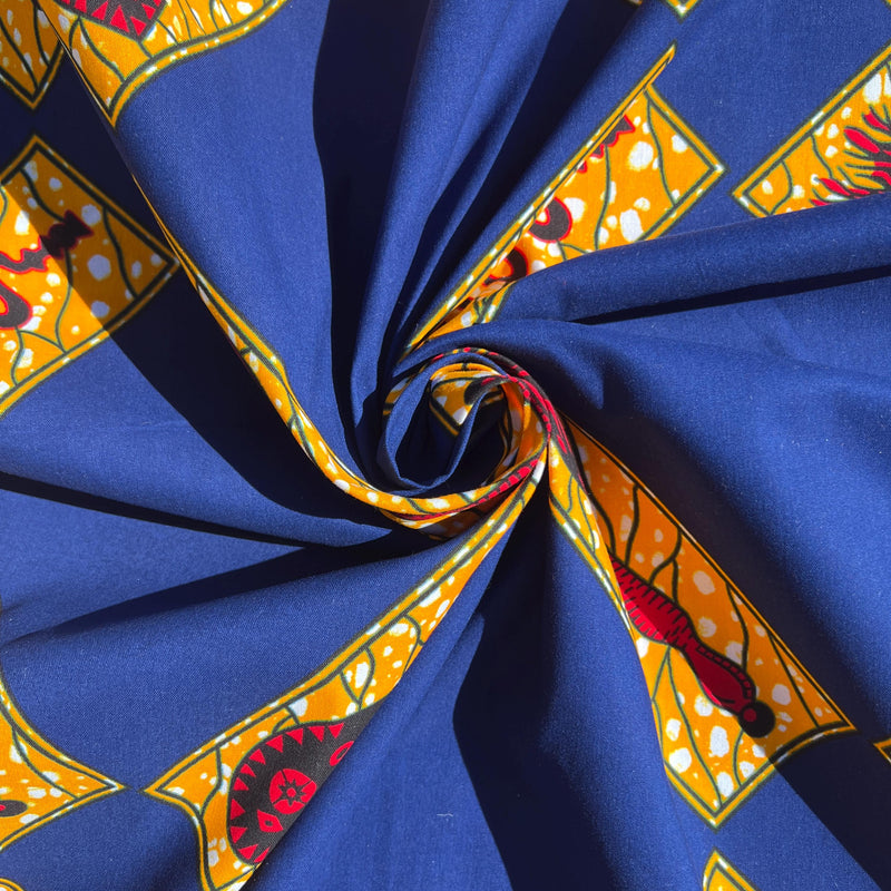 Handmade dress crafted from authentic Ankara cotton wax print fabric, demonstrating vibrant African textile suitable for garments, headwraps, and cultural fashion.